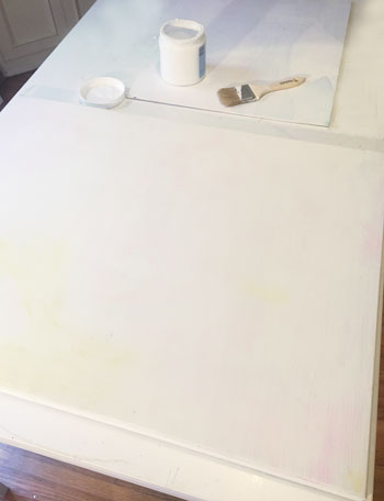 First coat of gesso on a canvas