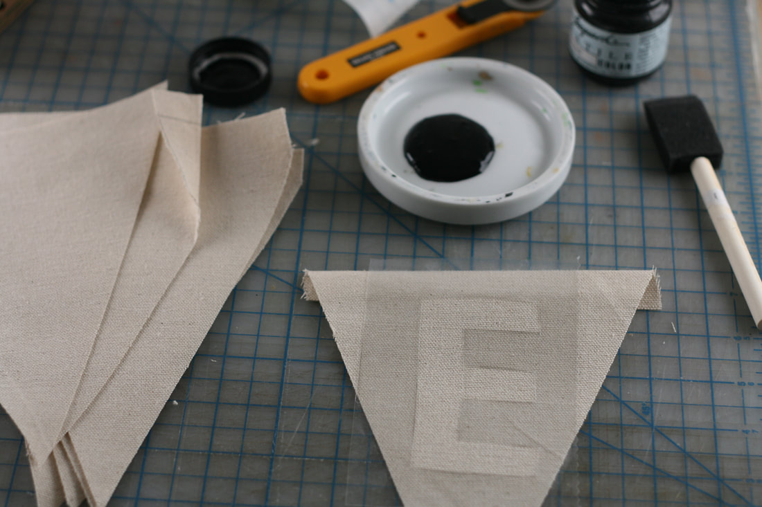 Cutting out triangle pendants for banner